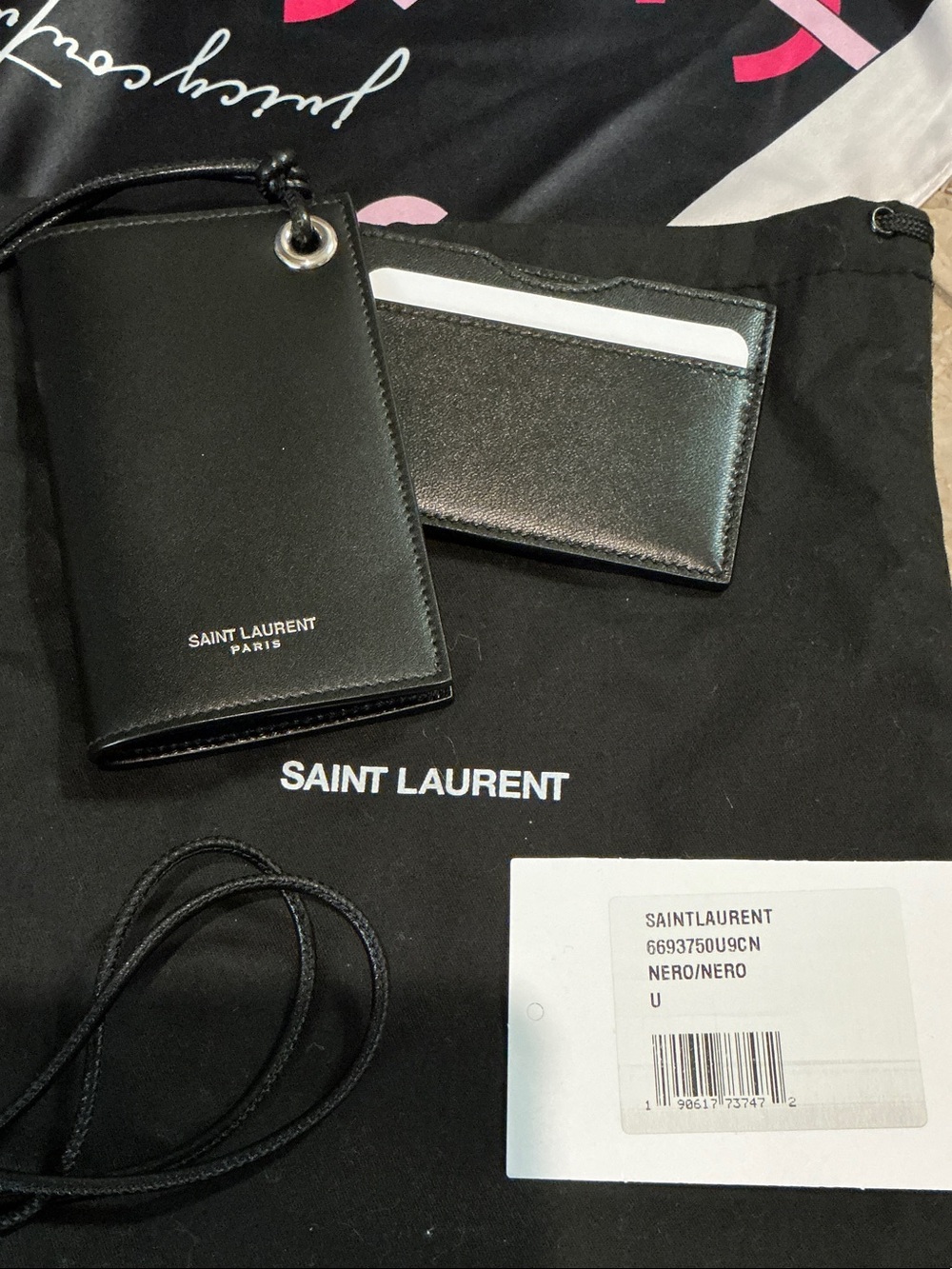 Authentic YSL Sant Laurent card holder lanyard, black leather. New condition